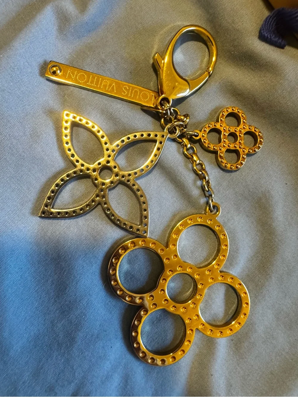 Louis Vuitton Gold-Tone Floral Logo Key Holder